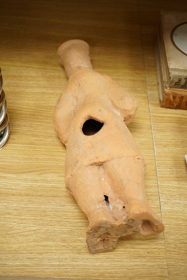 A Han Dynasty-style Chinese terracotta figure, 44cm high. Condition - fair